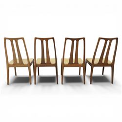 Nathan - teak drop leaf dining table and four Nathan dining chairs, the rectangular top with rounded corners fitted with twin hinged drop leaves and gate legs, extended to form an oval table 174cm in length, raised on square section supports united by stretchers, the chairs with teak frames and padded beige upholstered seat (H 96cm, W 48cm)