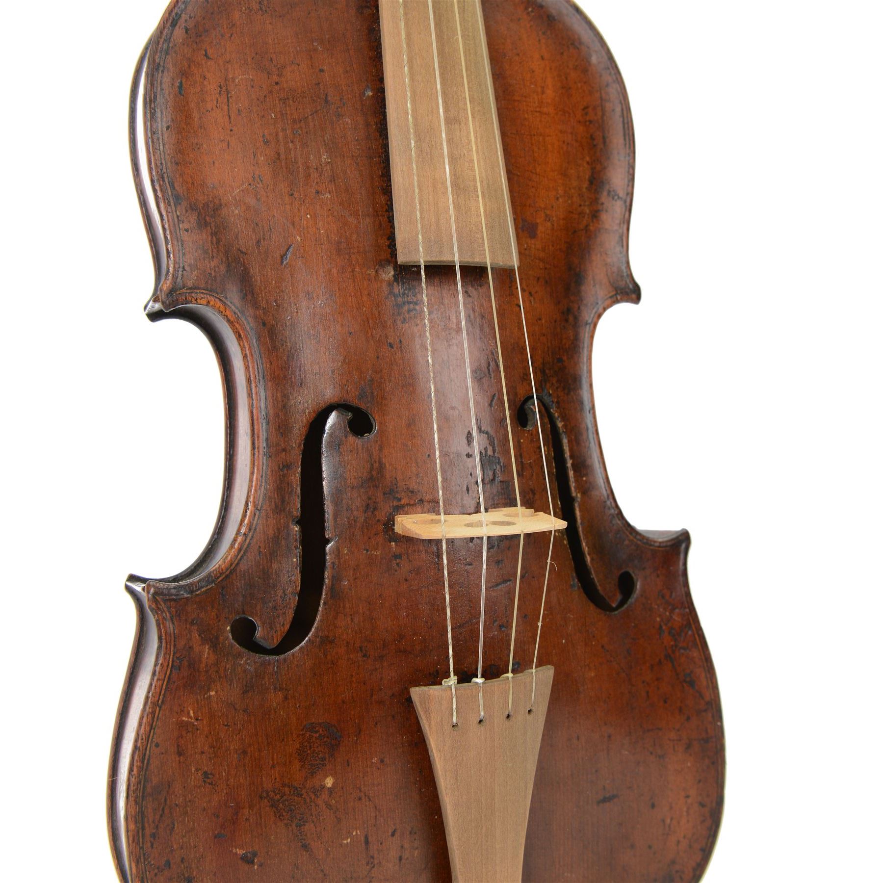 Violin - with a carved Lions head scroll and period style replacement fingerboard and fittings, in a later hard case, no bow, possibly from Germany or Bohemia.
Thought to have originated in the Tyrol region between Austria and Germany this design of scroll was very popular from the late 17th century onwards and well into the 19th century.