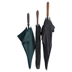 Three  Edwardian coachman's umbrellas with turned wooden handles, tallest H128cm
