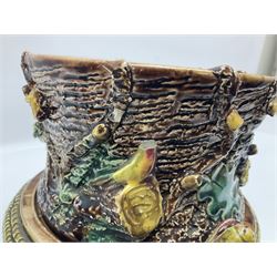 Majolica smokers set, in the form of a tree trunk, decorated with animals and a bird finial, dividing into three sections comprising of pipe stand, tobacco jar and ashtray, H38cm 