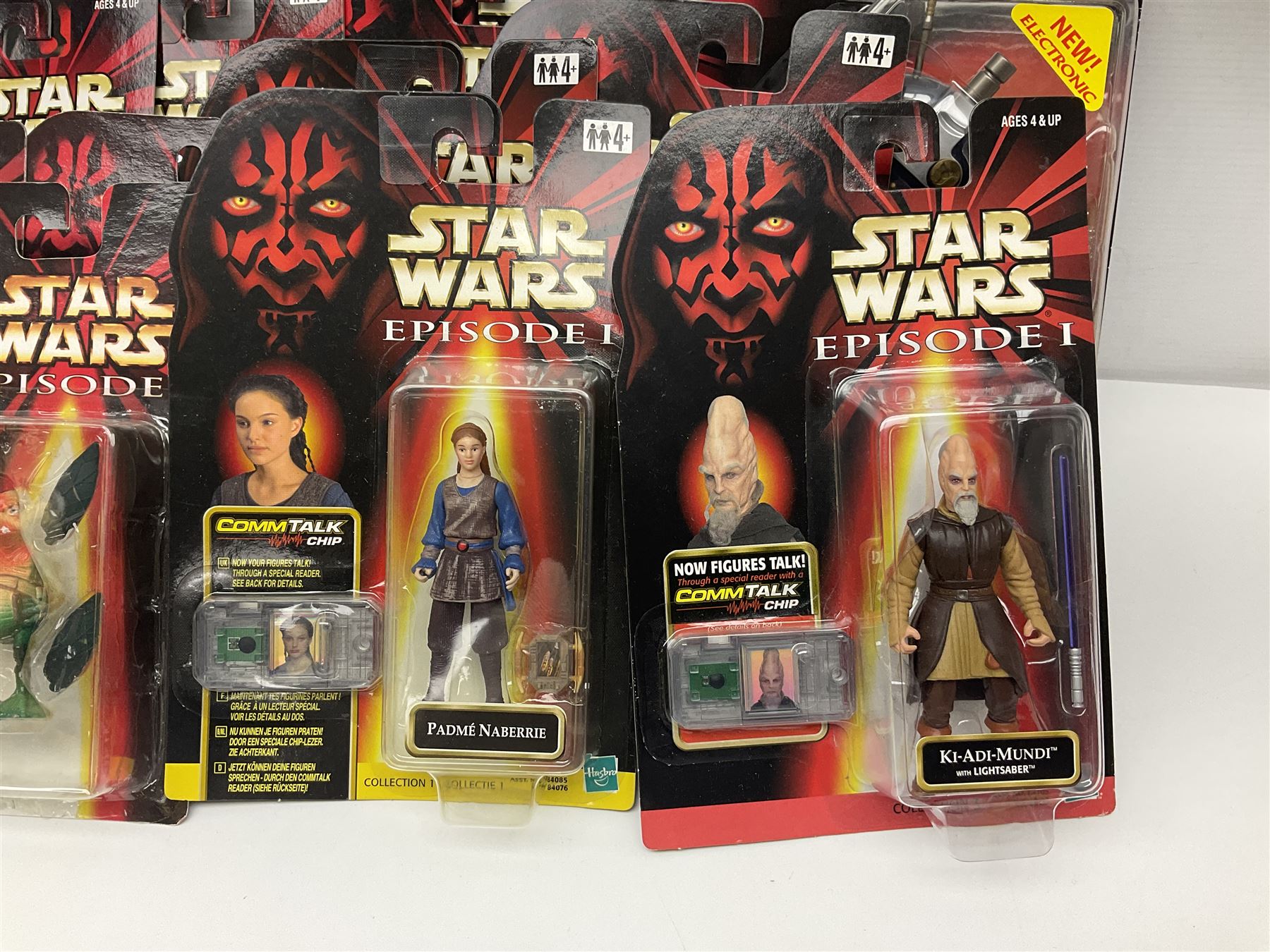 Star Wars - twenty-four Star Wars Episode One figures in card backed packaging; Collections 1, 2 and 3 with Electronic Commtalk reader for each figure's commtalk chip.
