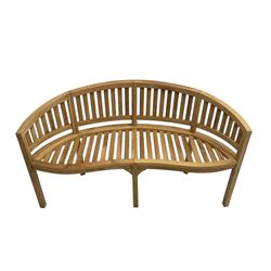 Solid teak garden bench, curved back and serpentine slatted seat