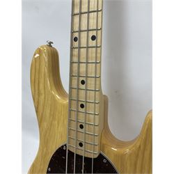 Ernie Ball Music Man Sting Ray 4 string bass guitar, in natural finish with roasted maple neck and tortoiseshell effect scratch guard, serial no 87485, in black Music Man hard case, guitar L114cm