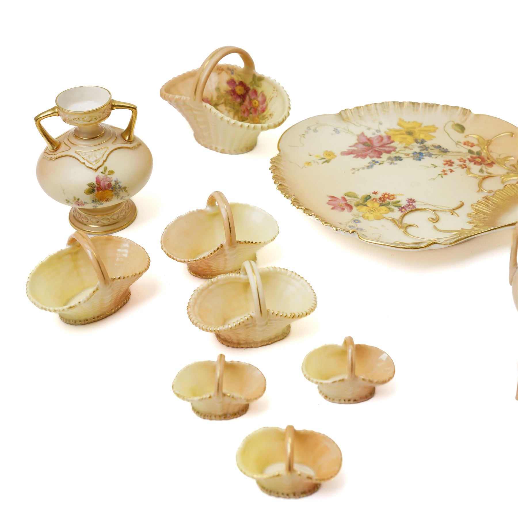 Large collection of miniature Royal Worcester hand-painted blush ivory wares, including various miniature baskets, large dish, miniature jug and others, with printed mark to bases