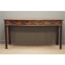  George lll style mahogany serpentine front serving table, moulded top above two swag and gadroon carved drawers on carved square supports and block feet, W168, H87cm, D64cm    