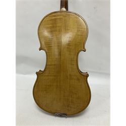 Copy of a full size Stradivarius violin, with an ebonised fretboard, tailpiece and tuning pegs, with a polished chin rest  Length 60cm