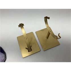 Pair of purple agate slices, polished with rough edges, raised upon gilt metal stands