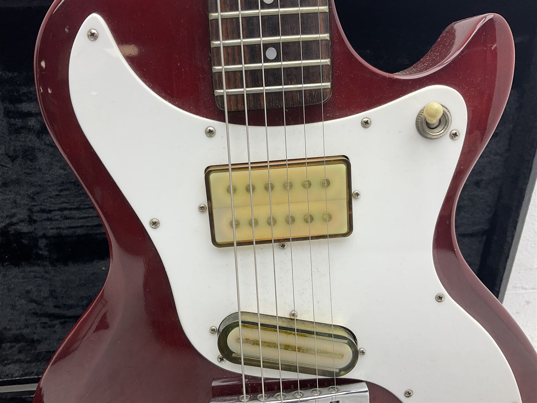 Gibson Marauder style six-string electric guitar with cherry coloured body, marked made in Japan L101cm; in locking hard carry case