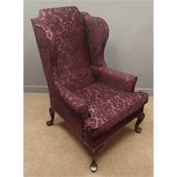  20th century Queen Anne style wingback armchair, upholstered in purple Damask fabric with loose feather cushion, walnut cabriole feet, W79cm  