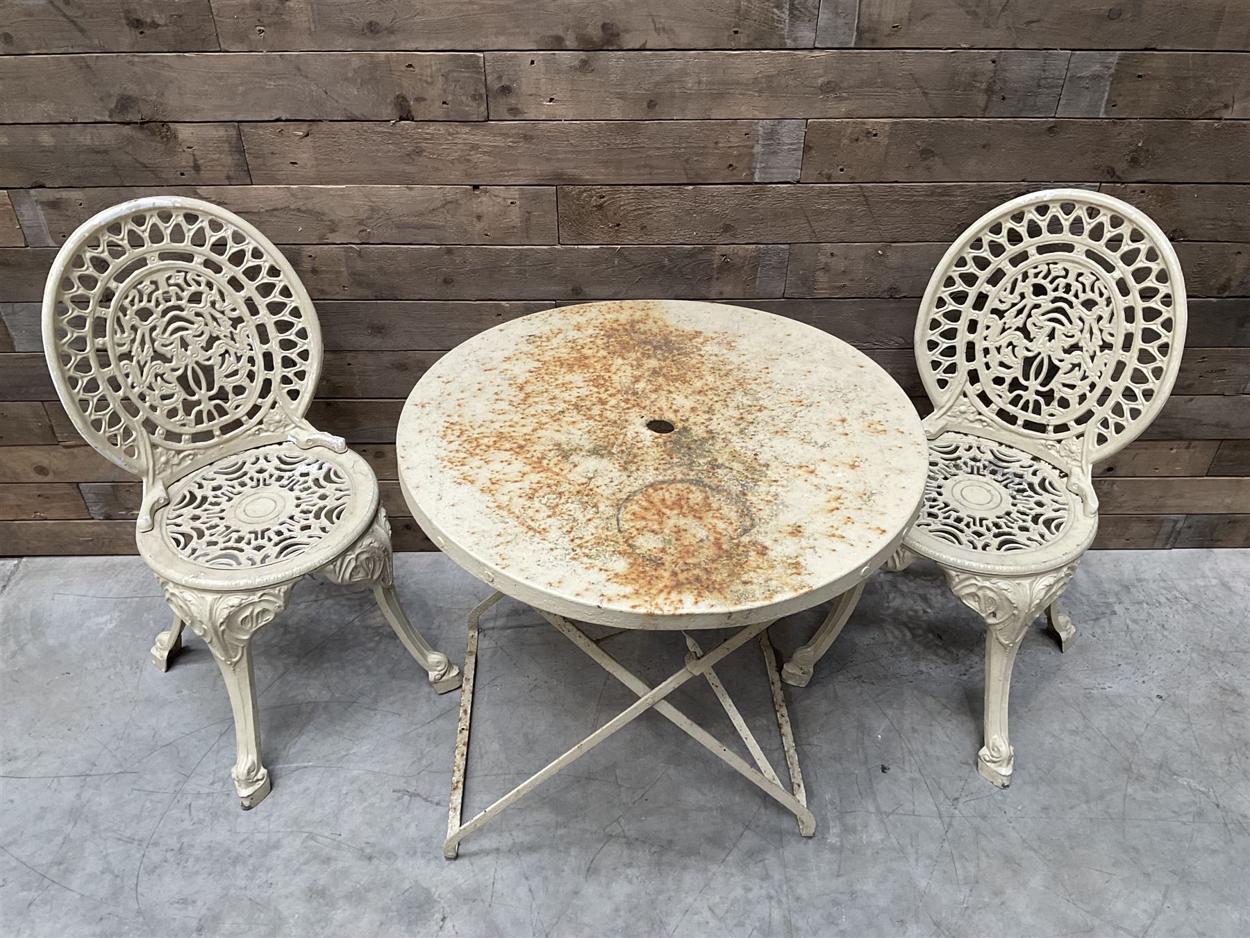 Circular cast aluminium garden table (D74cm, H68cm), and two chairs