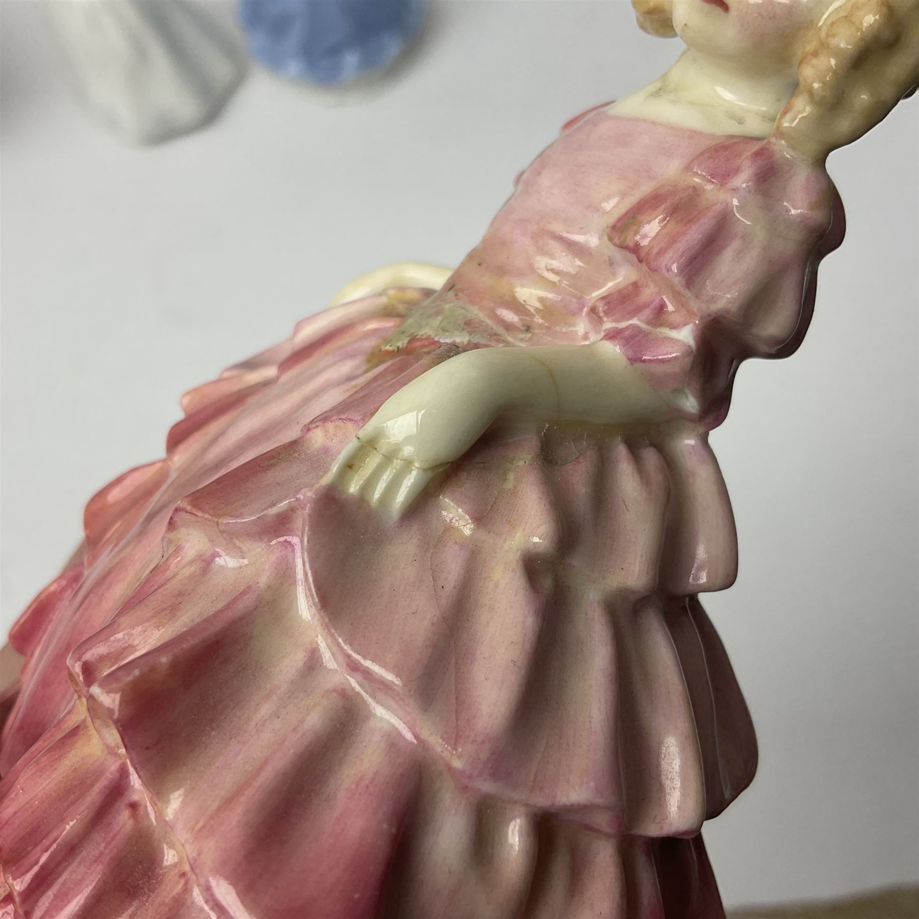 Five Royal Doulton figures, including Shore Leave HN2254, The Old Balloon Seller HN1315, Rose HN1348 etc, together with Royal Worcester Coquette