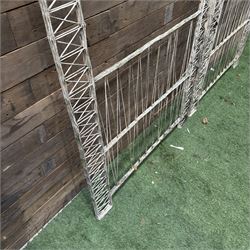 Four early 20th century French painted wicker garden trellis or dividers, rectangular form with internal arches