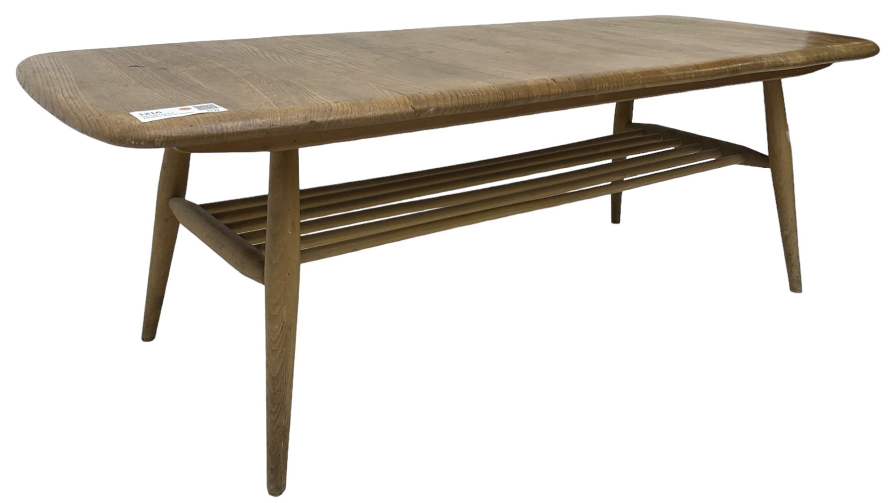 Ercol - mid-20th century blonde elm and beech model 459 coffee table, rectangular top over spindle magazine rack