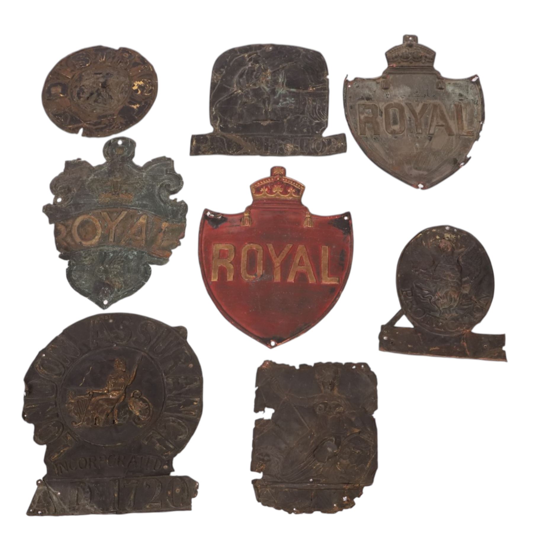 Eight 19th century tin fire insurance marks, comprising Phoenix Assurance Company Limited, Royal Insurance Company, Protector Fire Insurance Company, London Assurance Incorporated, County Fire Office, and District, Royal example H31cm
