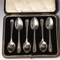 Set of six silver coffee spoons Birmingham 1933 , another set with bright cut stems and set of six silver handled pastry knives, all cased