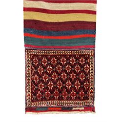 Southwest Persian Qashqai saddle bag, red and ivory ground with diamond-shaped star motifs in the top and bottom panels, central field decorated with alternating horizontal stripes