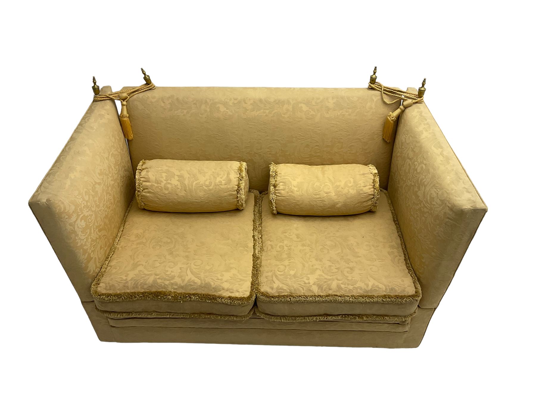 Edwardian knole design drop-arm two seat sofa, upholstered in yellow damask fabric with sprung back and seat and matching bolster cushions