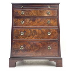 Small Georgian style mahogany bachelor's chest, the moulded rectangular top over slide and four graduating drawers with hardwood linings, circular brass plate and ring handles decorated with the Prince of Wales feathers, on bracket feet