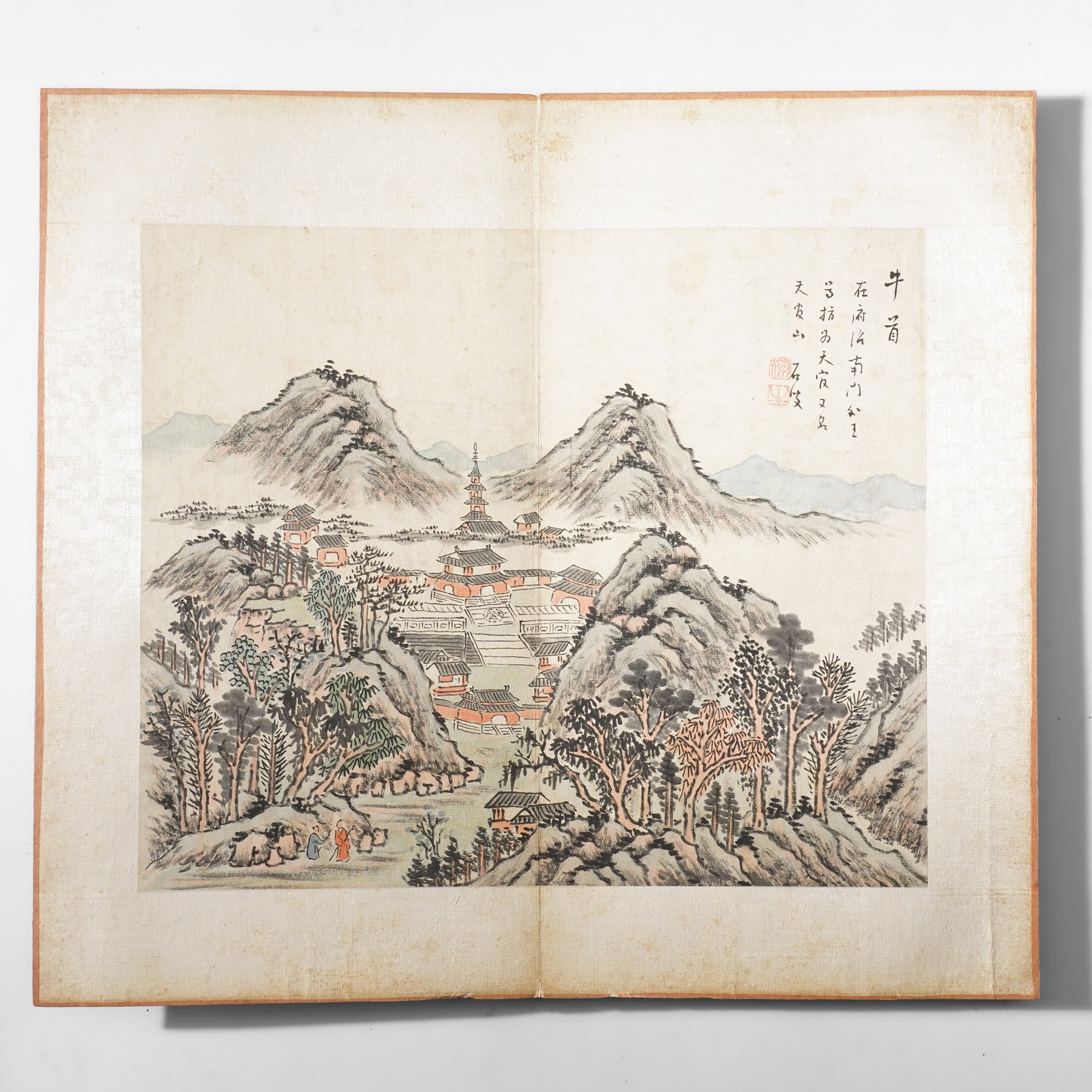 Chinese fold out book, comprising 12 hand-coloured woodblock landscapes each bearing inscription and artists seal  