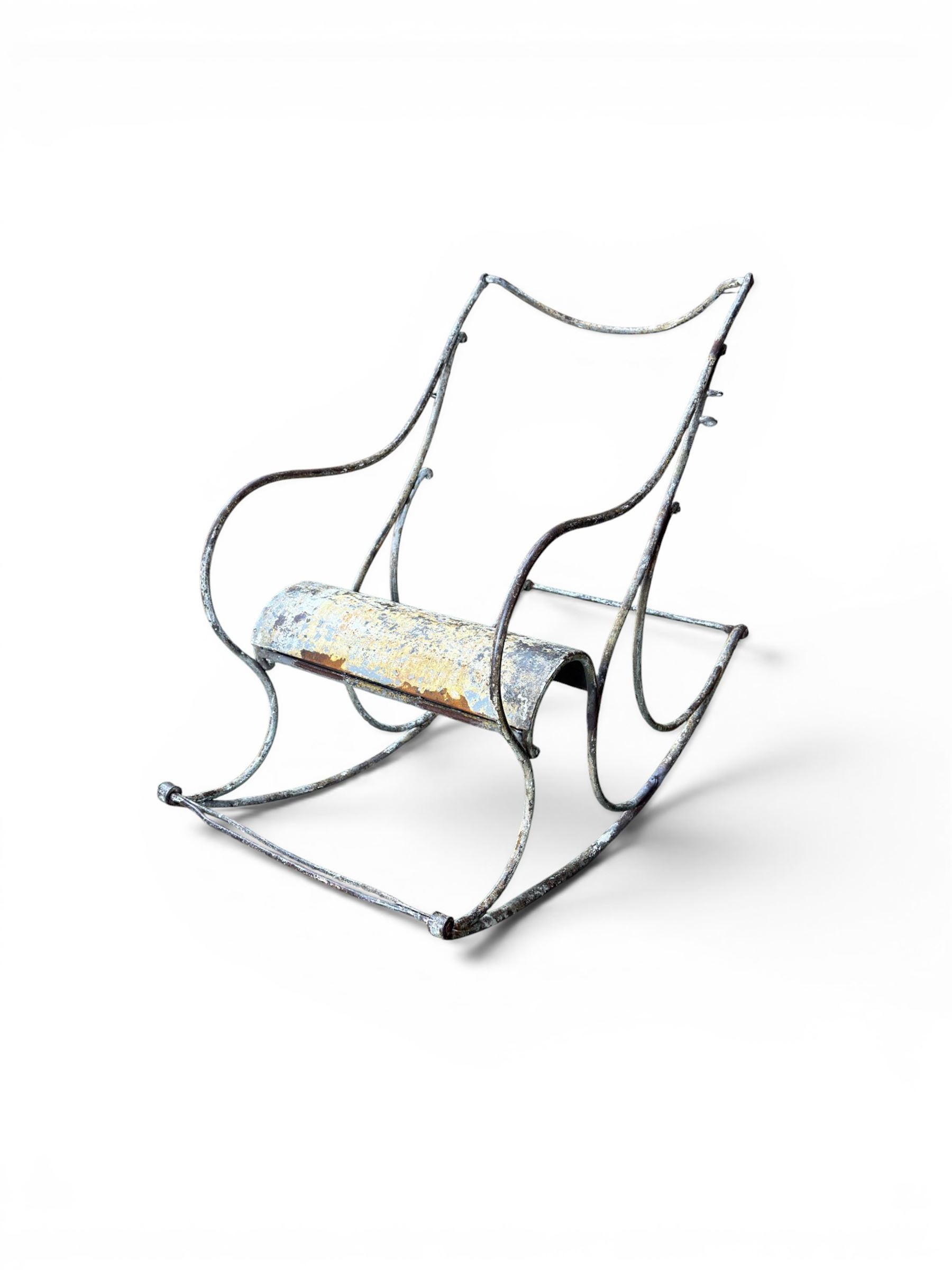 Pair of white painted cast metal garden chairs, ornate reclined backs, circular pierced seats on cabriole legs