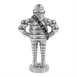 Metal hollow-cast figure, modelled as a Michelin Man stood upon a tire, H26.5cm