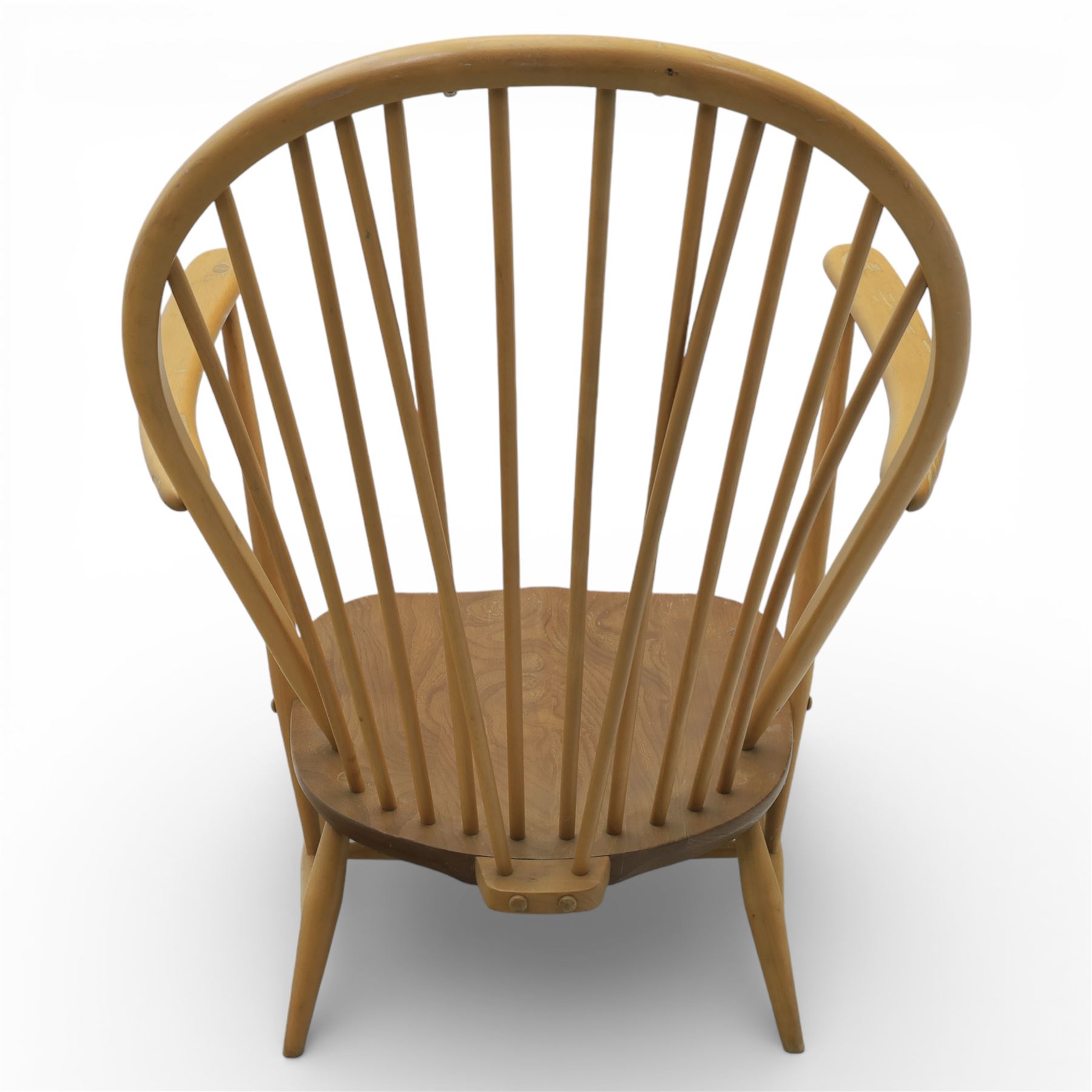 Ercol - Mid 20th century elm and beech Windsor armchair, the hooped spindle back over a shaped elm seat, with scroll front armrests on turned supports, raised on splayed tapering legs united by stretchers, lacking loose seat cushion