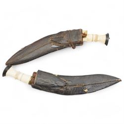 Nepalese Kukri with engraved blade and two skinning knives with bone handles in leather scabbards and another similar (2)