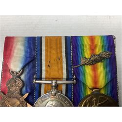 WW1 group of three medals comprising 1914-15 Star awarded to 536 Pte. T. Hall North'd Yeo. and British War Medal and Victory Medal with oak leaves awarded to 2.Lieut. T. Hall; with ribbons; displayed on board for wearing; some biographical details