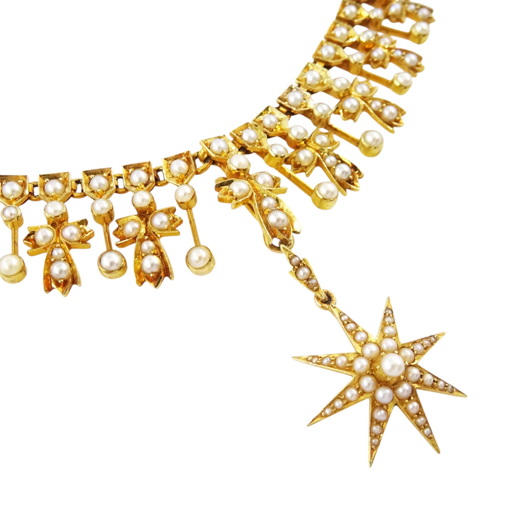 Edwardian 15ct gold split pearl fringe necklace, thirteen graduating cross pendants, each spaced by pearl drops, the centre cross suspending an 18ct gold pearl star pendant, to a pearl set chain necklace, in silk and velvet lined case by Elkington, Glasgow