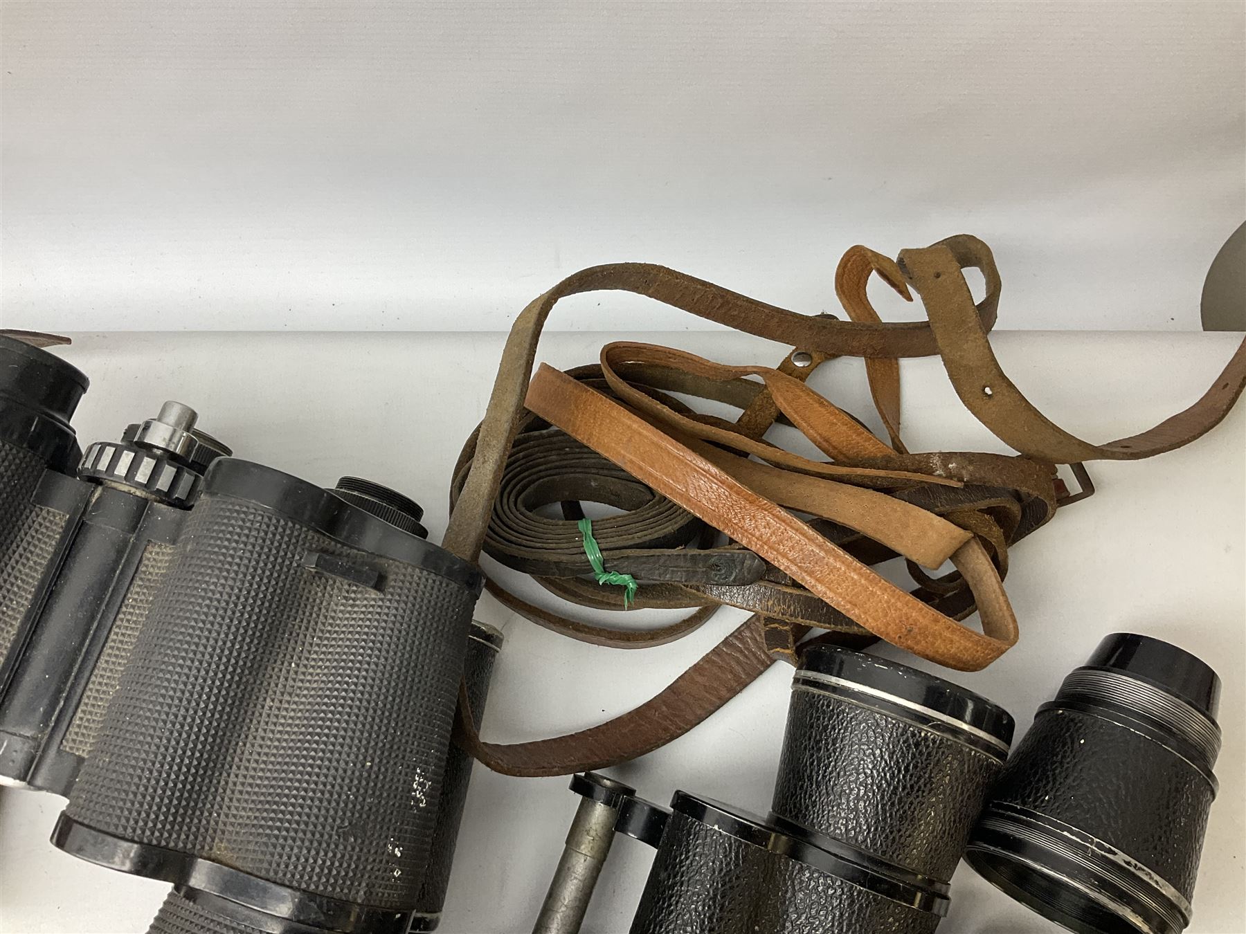 Quantity of binoculars for spares and repair, to include Cogswell & Harrison Primic 8x30, Prinz 8x30, Telstar 35x60, Zeiss Wetzland 8x40 etc