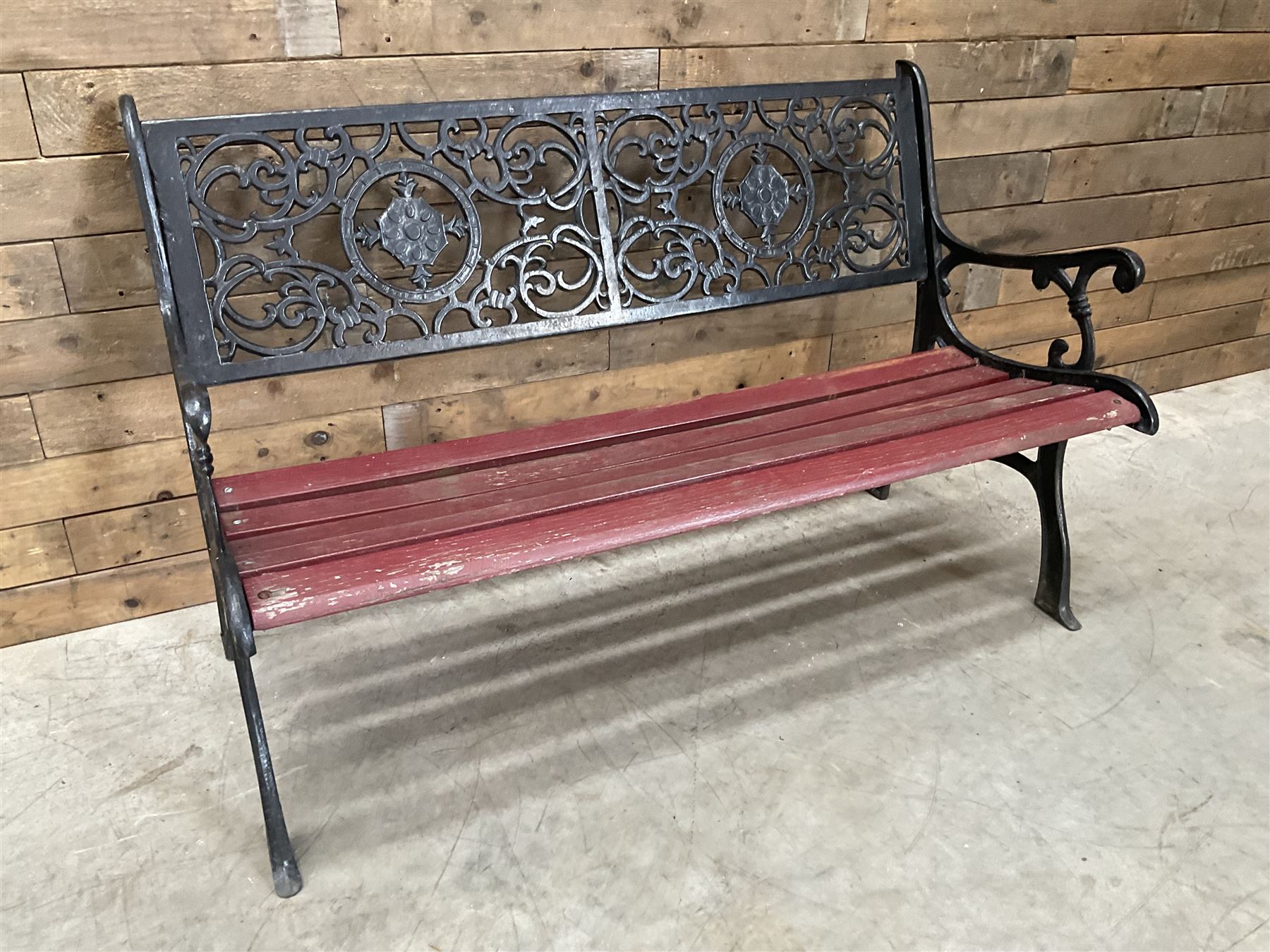 Cast iron and wood slatted garden bench