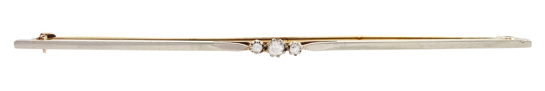 9ct gold bar three stone round brilliant cut diamond bar brooch, stamped and in fitted box 