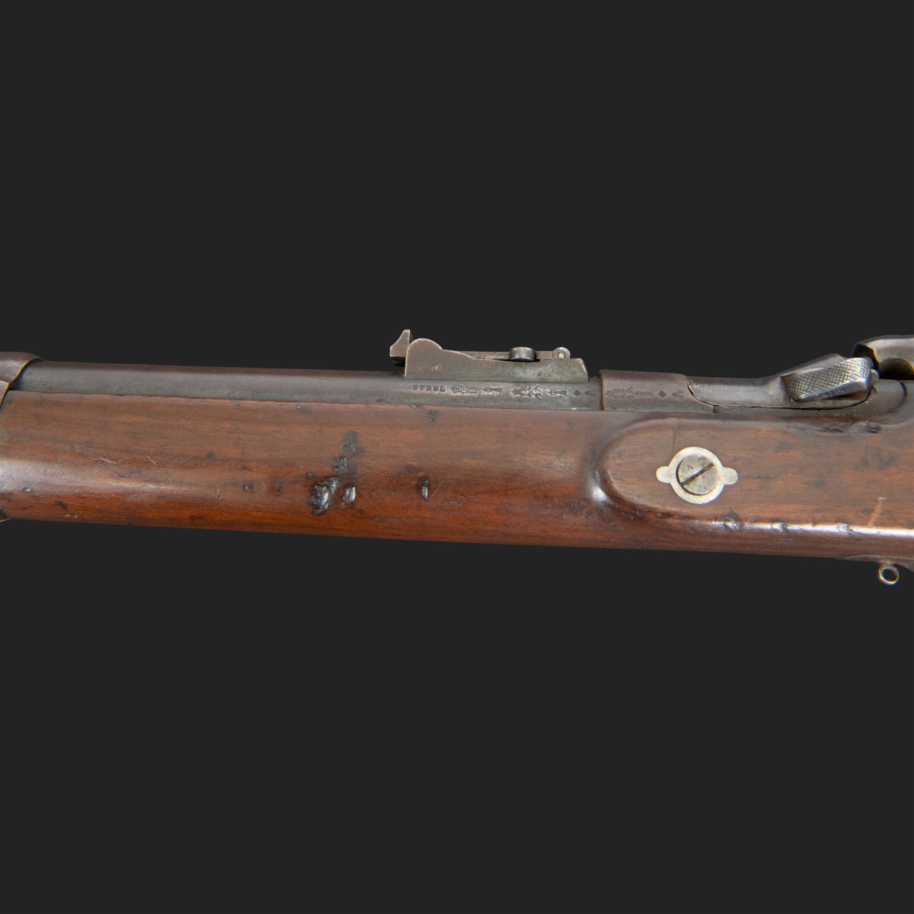 Snider-Enfield service rifle .577 calibre, barrel 33 in., tangent/ladder back sight, action marked with crowned V.R BSA & Co 1872, full stocked with two barrel bands, steel clearing rod, walnut stock marked Mx1 93 Birmingham, overall L124cm
