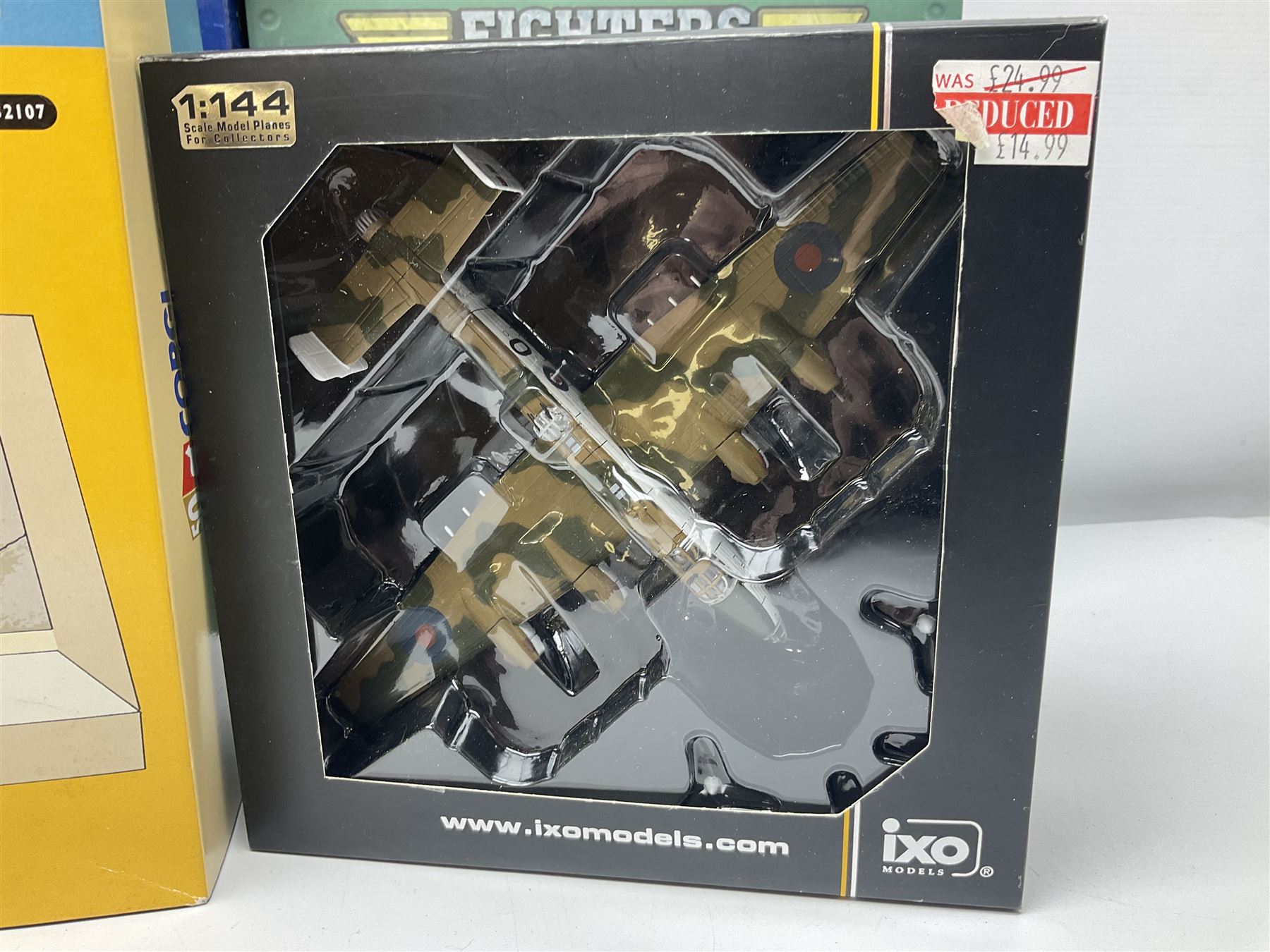 Fifteen modern die-cast models of aircraft by Corgi, Atlas Editions and Ixo including Aviation Archive, War Birds, Fighters of WWII etc; and model of an MGB Sports Car; all boxed (16)