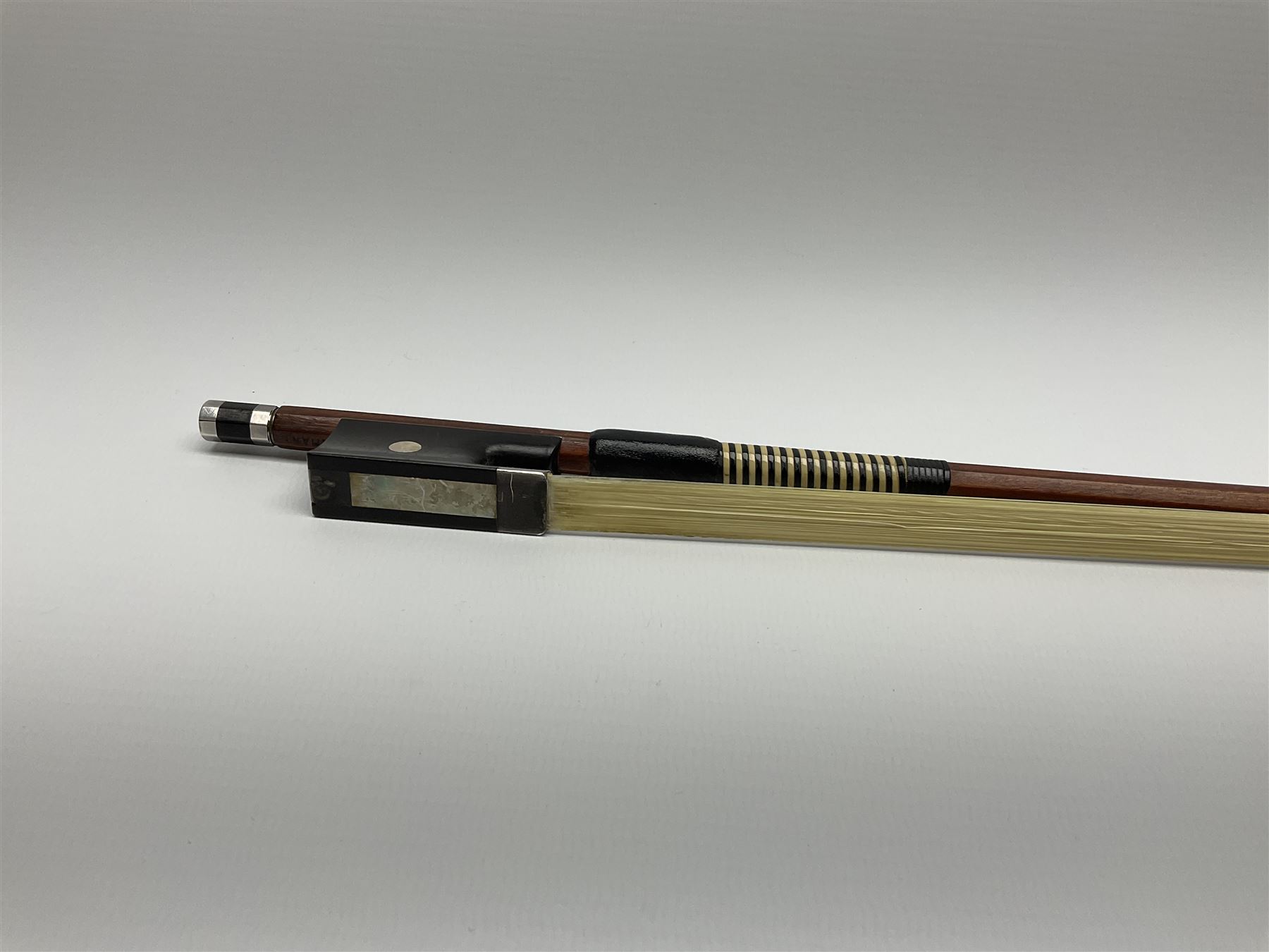 Alfred Knoll silver mounted two-star pernambuco violin bow L74.5cm