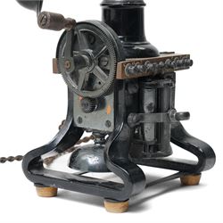 Early 20th century L M Ericsson & Co Skeletal table telephone, the earpiece impressed No.28, with black painted frame and possibly original wires, H29cm