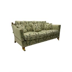 Three-piece hardwood-framed lounge suite - large two-seat Knole sofa with drop ends, upholstered in patterned fabric decorated with urns and foliage (W190cm, D117cm, H88cm); armchair upholstered in contrasting geometric pattern fabric (W83cm, D102cm, H93cm); and another armchair (W82cm, D102cm, H92cm) (3)