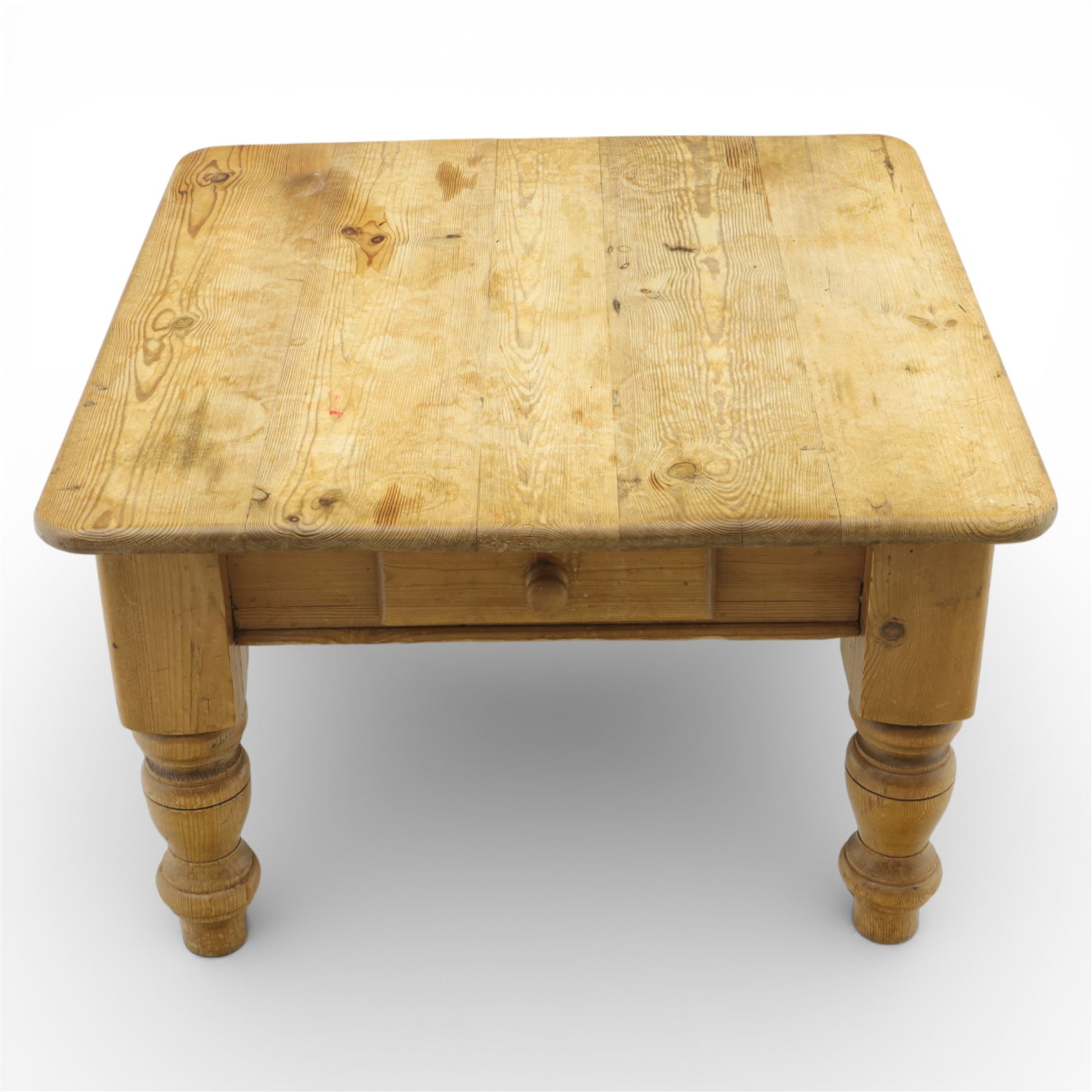 20th century stripped pine coffee table, square top over two frieze drawers, raised on block and turned supports