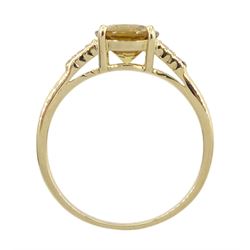 9ct gold yellow zircon ring, with white zircon shoulders, hallmarked