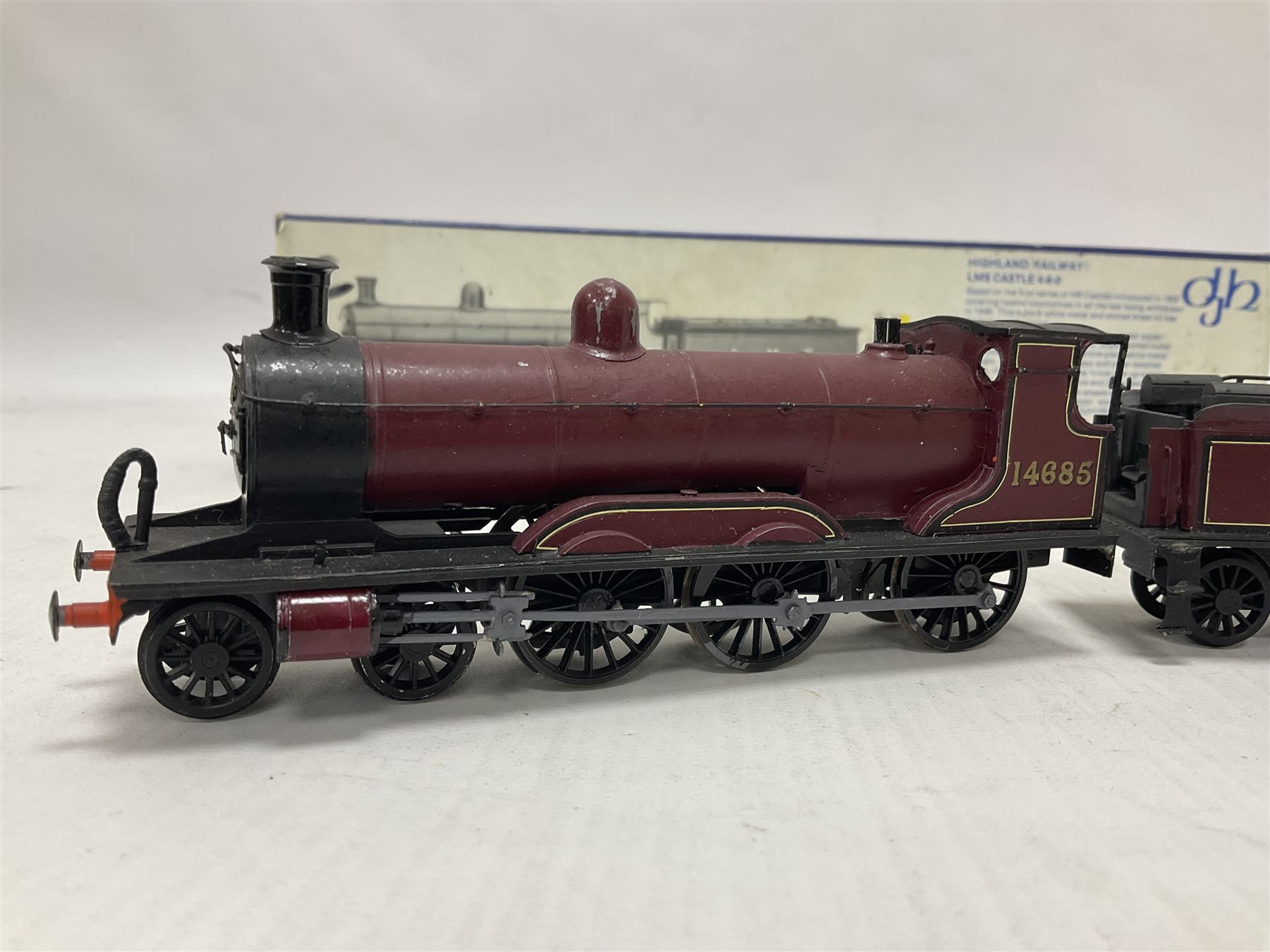 DJH Models - two ‘00’ gauge kit built model railway locomotives and tenders comprising K37 Highland Railway/LMS Castle 4-6-0 no.14685 in LMS crimson and K38 BR/WD 2-8-0 no.90124 in BR black; in original boxes 