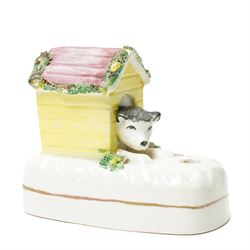 Pair of late 19th century Staffordshire pen holders, modelled as dogs in kennels, W9.5cm