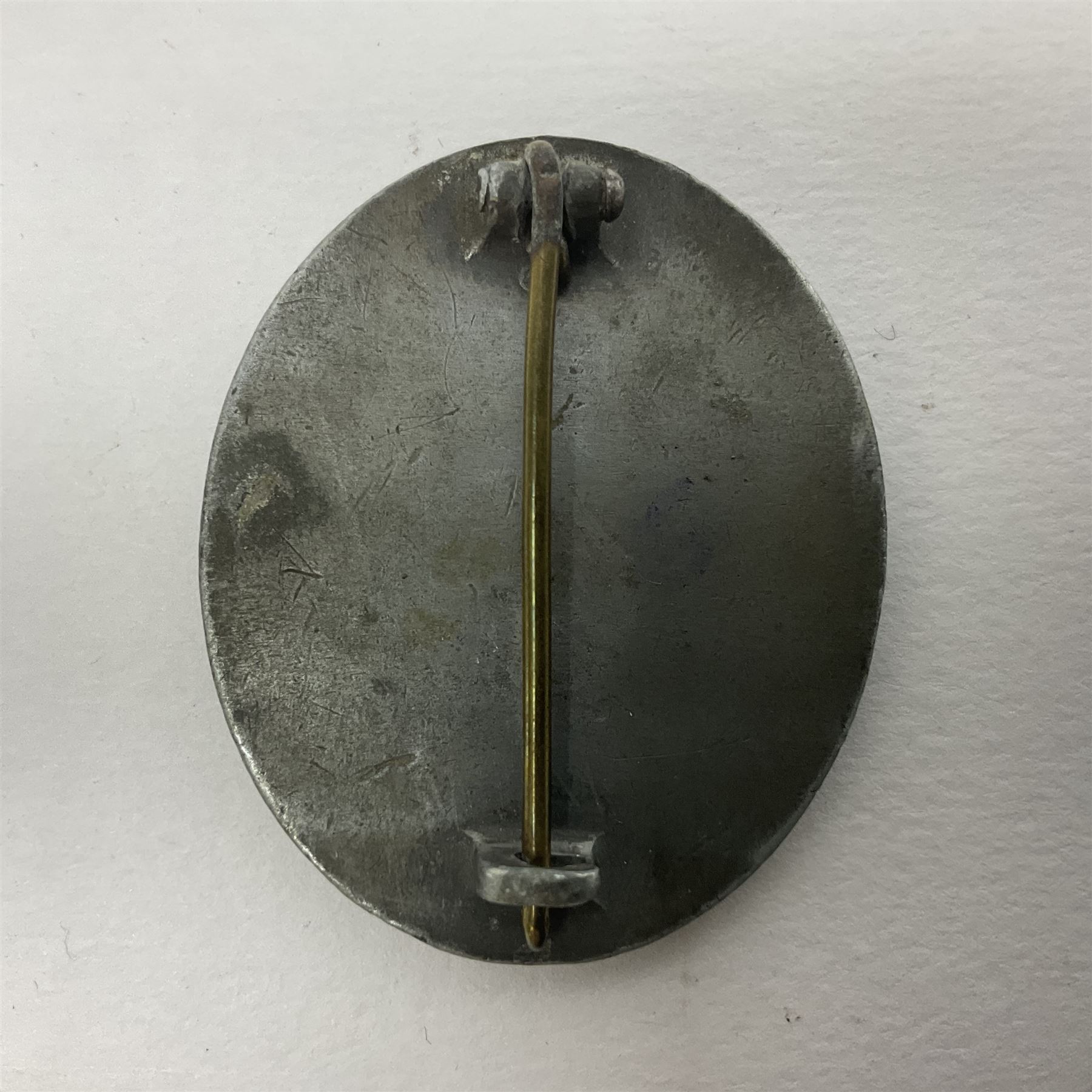 Three WW2 German wound badges - two 'silver' and one bronze with traces of silvering (3)