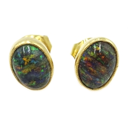  Black cabachon opal and diamond gold cluster ring, stamped 18ct and matching pair of stud earrings both purchased from Boodle and Dunthorne  