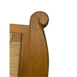 Reynold Eunson (1932–1978) for David Munro Kirkness, Kirkwall, Orkney - oak framed Orkney chair, woven straw canopy back, drop-in rush seat, the arm terminals carved with scrolls, on square tapering supports joined by plain stretchers, the front rail inscribed with makers marks