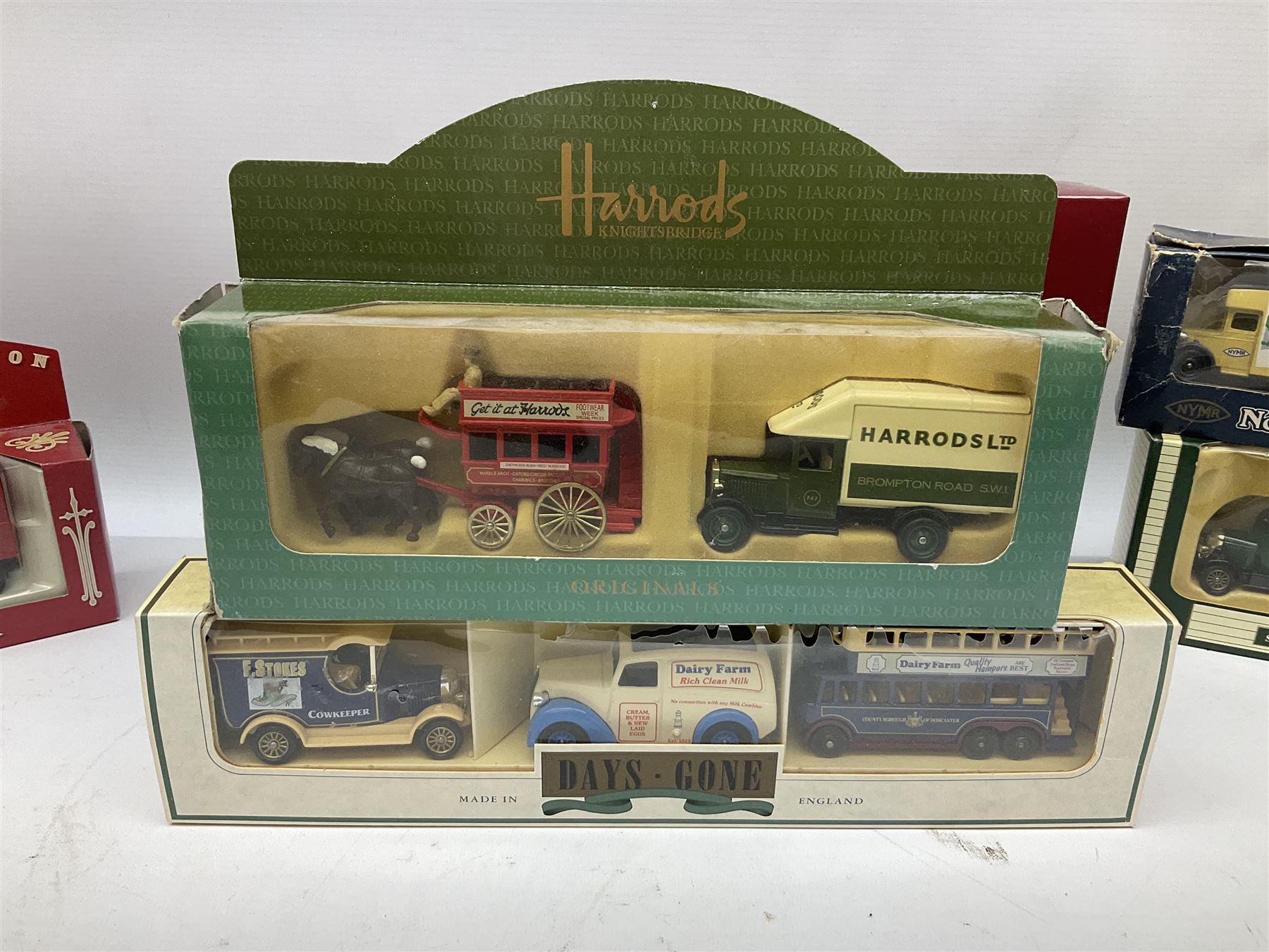 Collection of Diecast model vehicles, including Lledo The Golden Days of the Film Industry limited edition set, Lledo H Samuel boxed vehicle, and other similar examples 