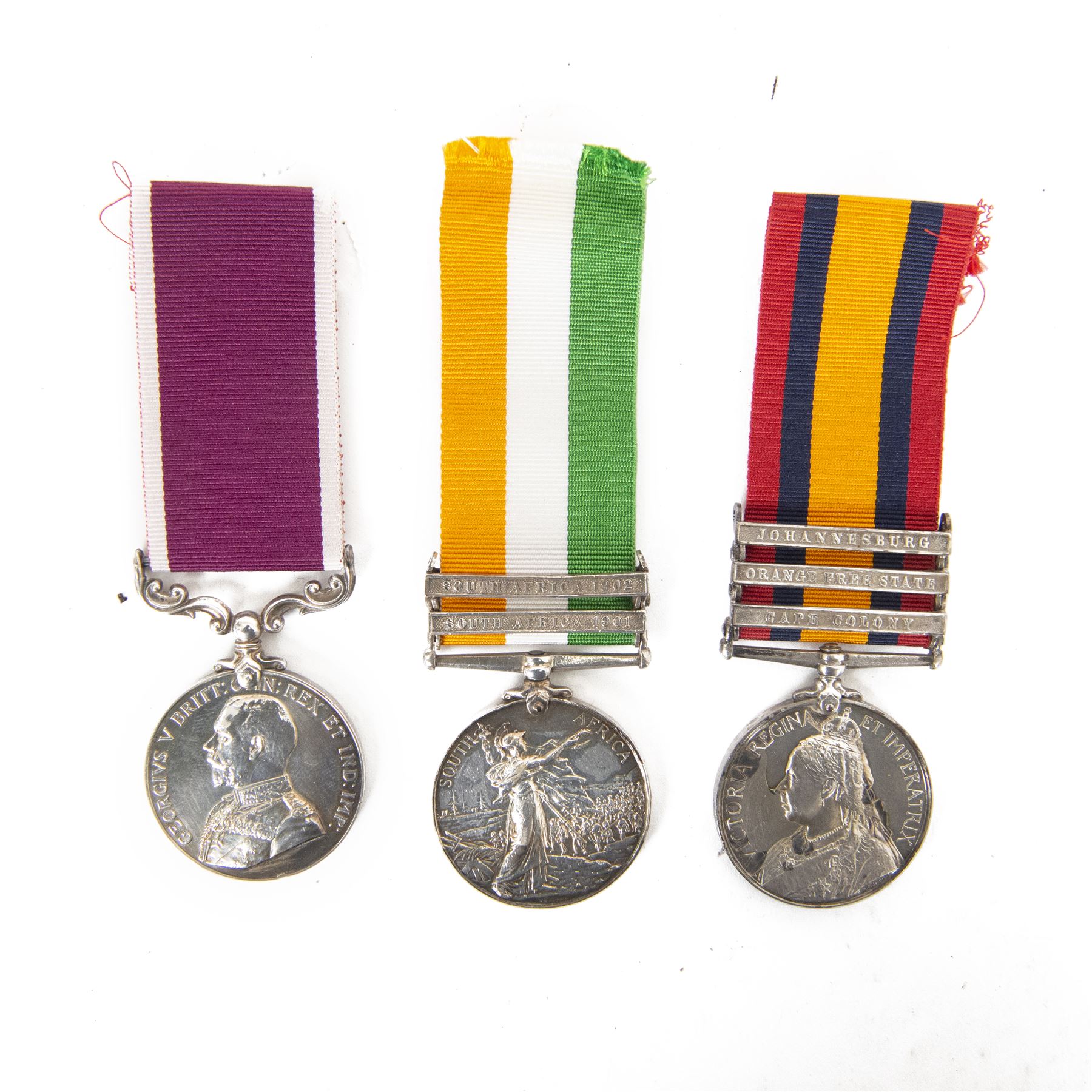 Queen South Africa medal with clasps for Johannesburg, Orange Free State and Cape Colony, Kings South Africa medal with clasps for South Africa 1902 and South Africa 1901 and G.V.R Army Meritorious Service Medal, all awarded to different soldiers 