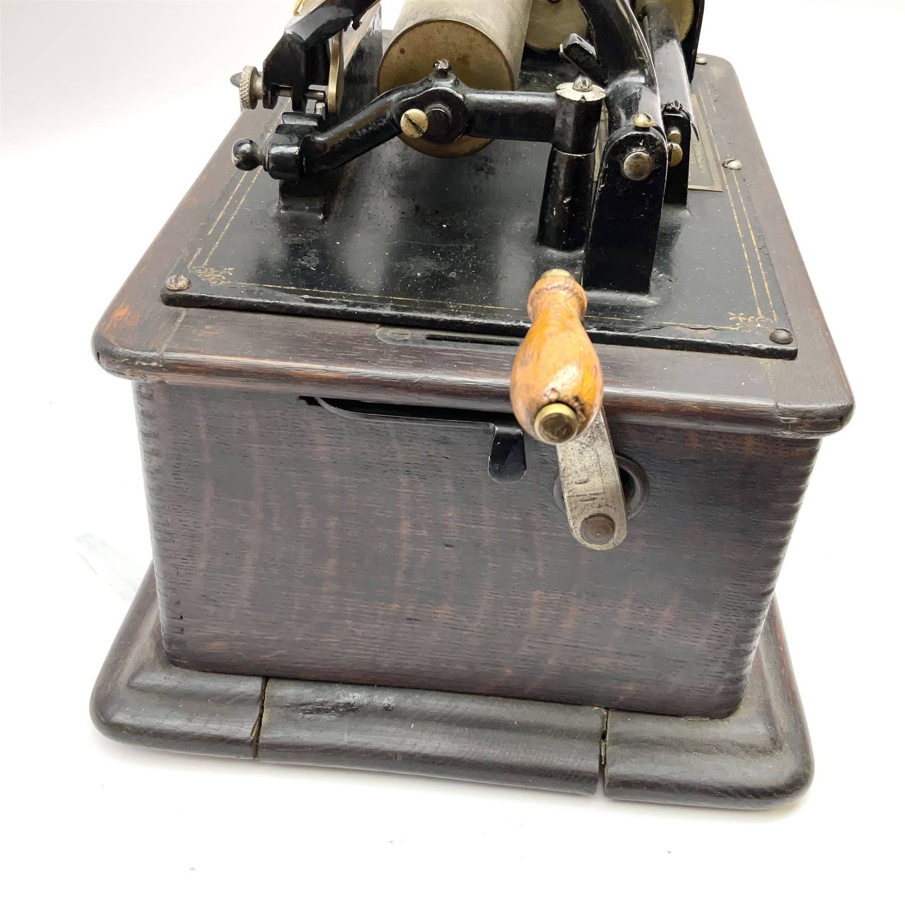 Edison Standard Phonograph with oak base (no cover), the reproducer marked 'Model C', serial no. 634857, last patent date Oct.1905, with black japanned conical horn L33cm; together with five cylinders