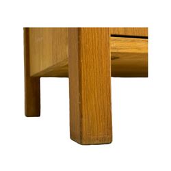 Laura Ashley - 'Milton' light oak sideboard, fitted with four central drawers flanked by two panelled cupboards, on square supports