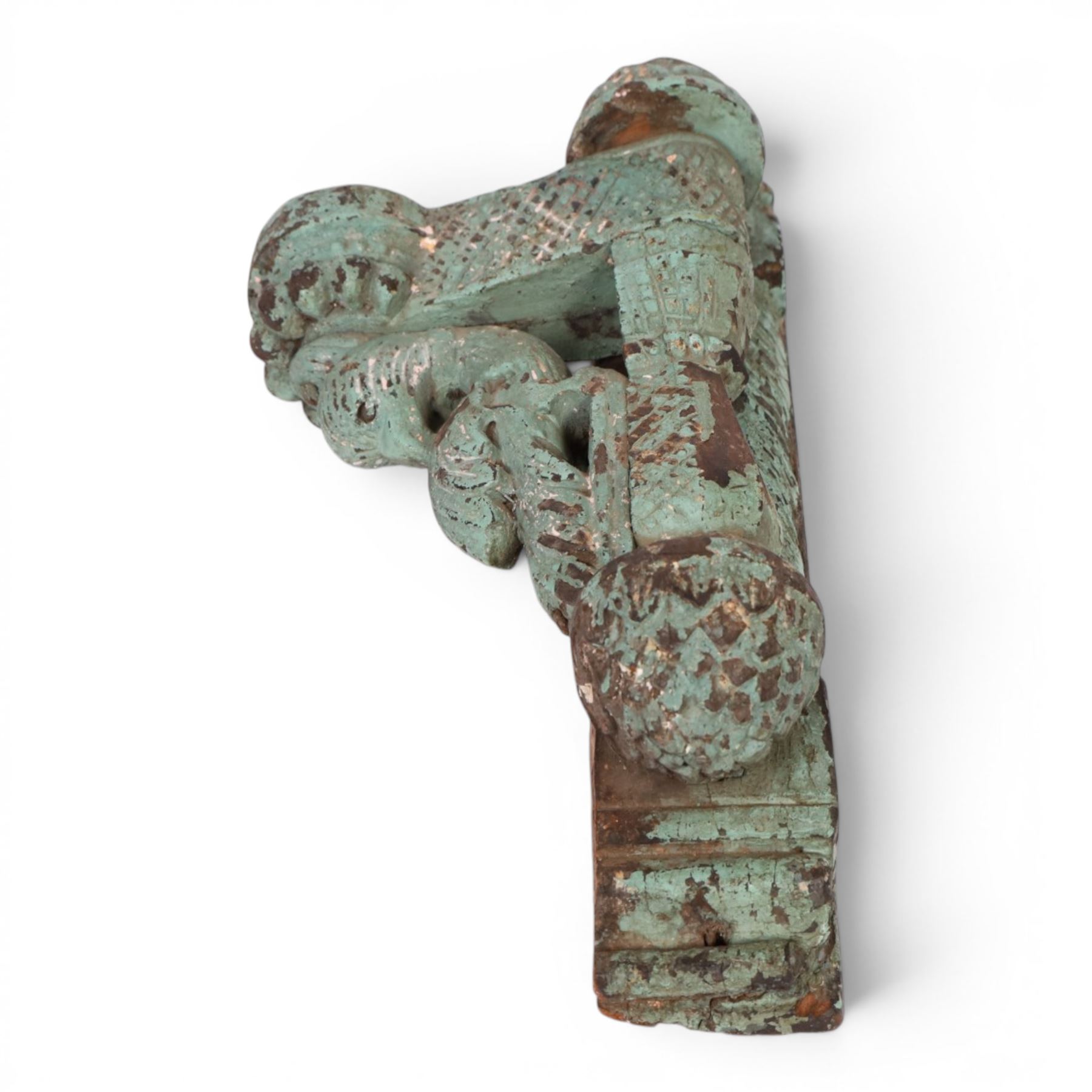 Indian candle bracket, in the form of a peacock, with residual blue paint, H42cm