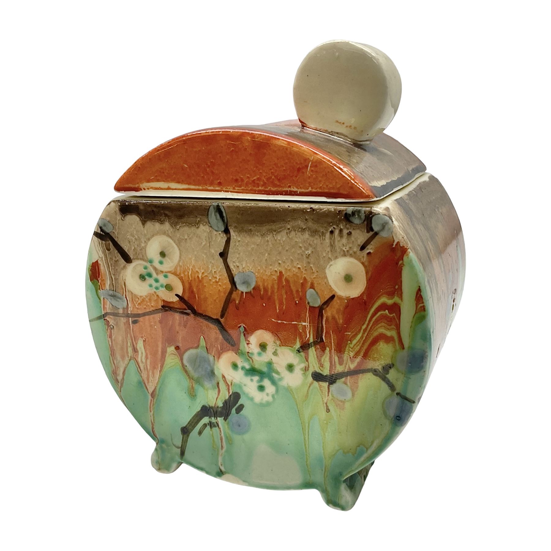Clarice Cliff Bizarre for Wilkinson Pottery, Bon Jour shape preserve pot decorated in the May Blossom pattern, hand painted with stylised blossom upon a streaked merging green and orange ground, with conforming lift off lid, with black printed mark beneath, H10cm